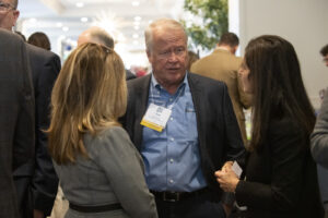 Attendees discuss business during the Conway Center Expo