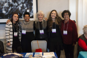 A team poses during the Conway Center Expo