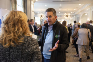 man and woman talking during the Conway Center Expo