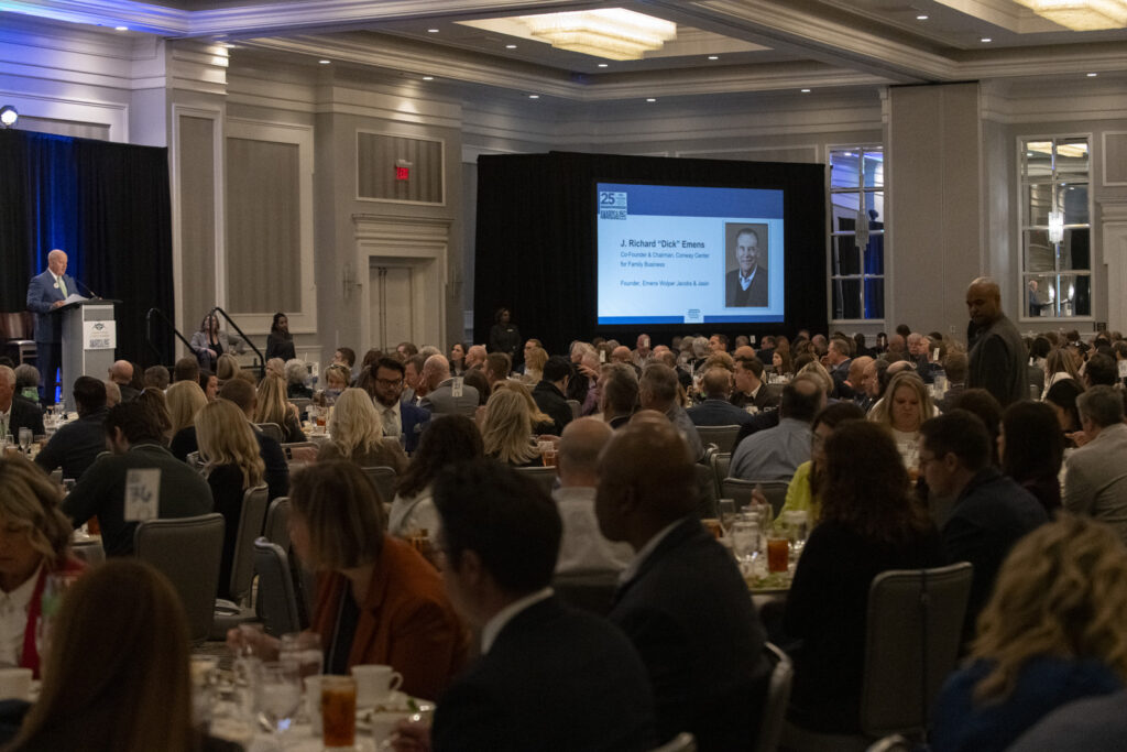 Speaker addresses filled ballroom during the event photography coverage for the Conway Family Business Awards 2023