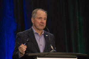 speaker at podium during the event photography coverage for the Conway Family Business Awards 2023