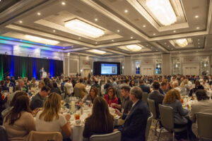 Attendees enjoy the luncheon during the event photography coverage for the Conway Family Business Awards 2023