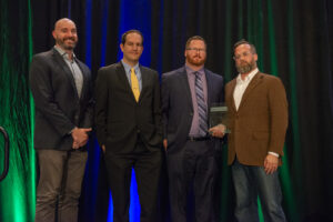 The Robintek team receives their award during the 2023 Conway Family Business Awards