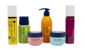 group of Bright Girl beauty products on white background in multicolored packaging