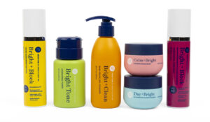 group of Bright Girl beauty products on white background standing next to one another