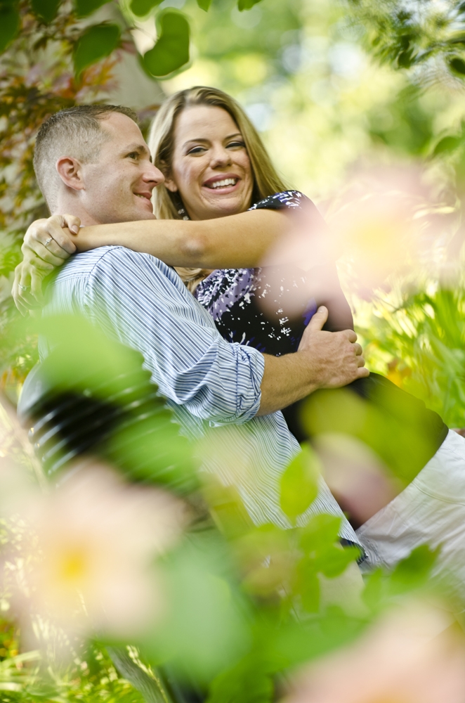 Engagement Photography - Outdoor couple hugging and smiling at each other