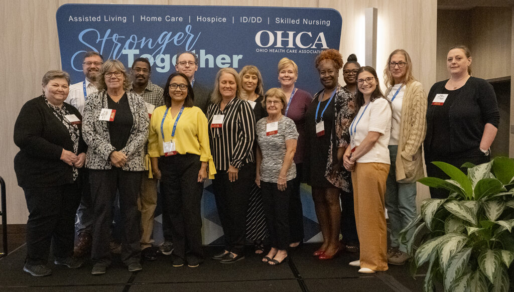 All award winners pose on stage during OHCA's 2023 Excellence Awards