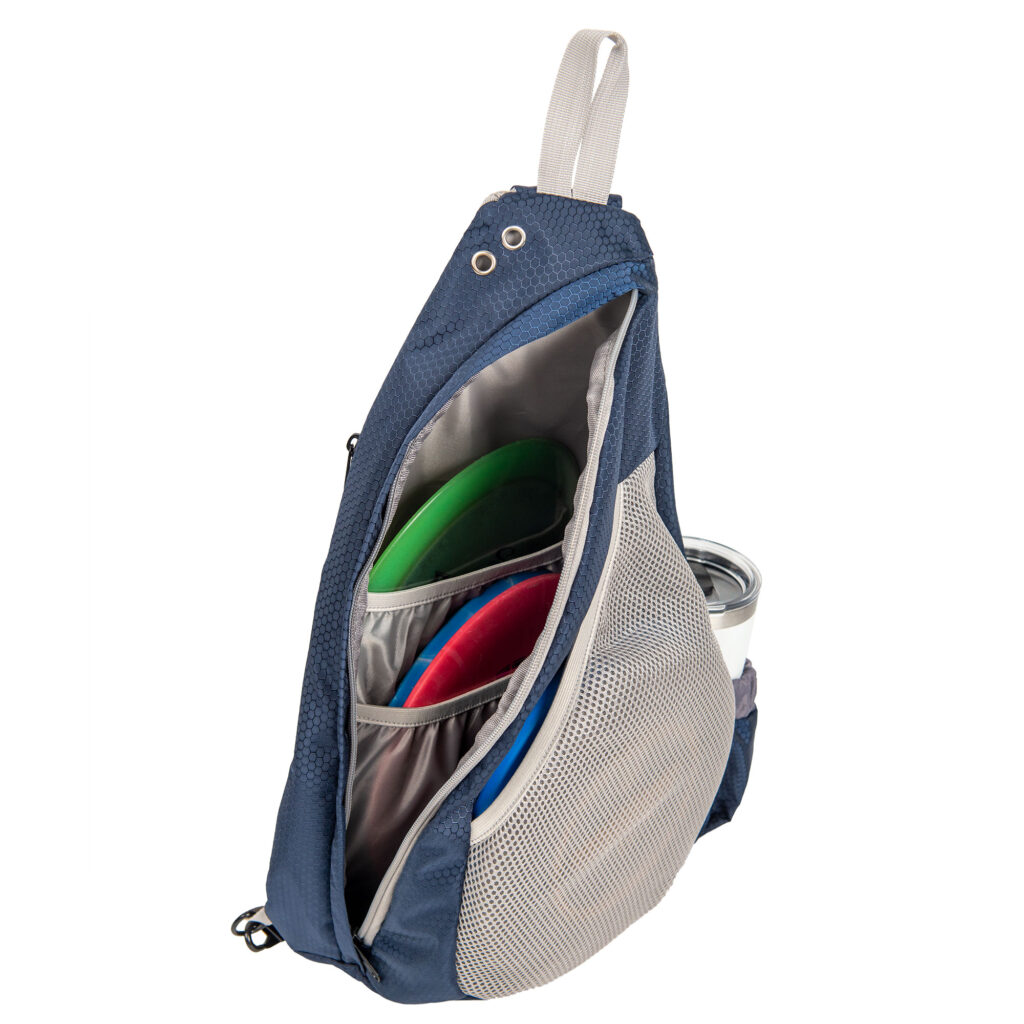blue and gray disc golf bag open to show interior with props for amazon product photography listing