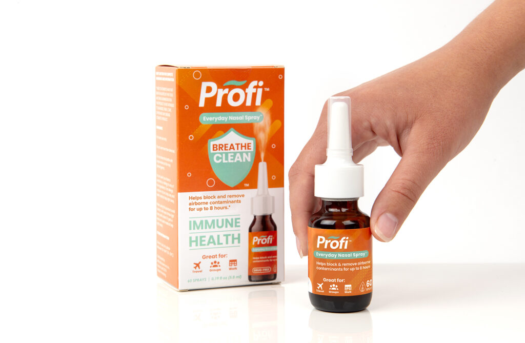 product photo of nasal spray and box with model hand reaching for the spray